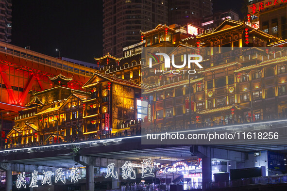 Tourists visit the Hongya Cave scenic spot in Chongqing, China, on September 28, 2024. 