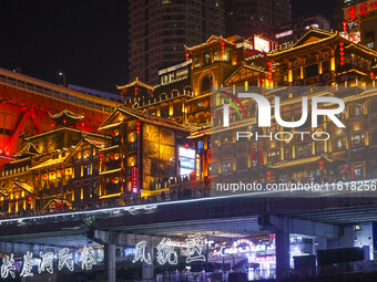 Tourists visit the Hongya Cave scenic spot in Chongqing, China, on September 28, 2024. (