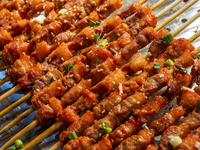 Mutton skewers are displayed at a barbecue stand at a night market in Nanning, China, on April 13, 2024. (