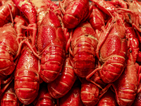 Crayfish are displayed at a barbecue stall at a night market in Nanning, China, on April 13, 2024. (