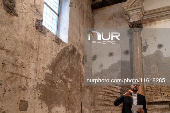 Poet Gabriele Tinti attends the ''Divine Echoes'' poems reading at Sant' Andrea De Scaphis in Rome, Italy, on September 28, 2024. 