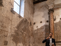 Poet Gabriele Tinti attends the ''Divine Echoes'' poems reading at Sant' Andrea De Scaphis in Rome, Italy, on September 28, 2024. (