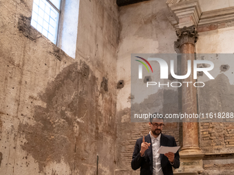 Poet Gabriele Tinti attends the ''Divine Echoes'' poems reading at Sant' Andrea De Scaphis in Rome, Italy, on September 28, 2024. (