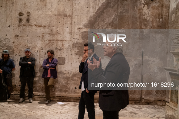 Poet Gabriele Tinti and director Abel Ferrara attend the ''Divine Echoes'' poems reading at Sant' Andrea De Scaphis in Rome, Italy, on Septe...