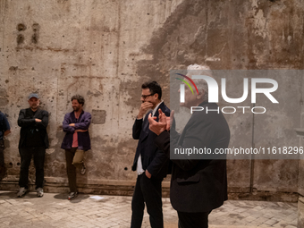 Poet Gabriele Tinti and director Abel Ferrara attend the ''Divine Echoes'' poems reading at Sant' Andrea De Scaphis in Rome, Italy, on Septe...