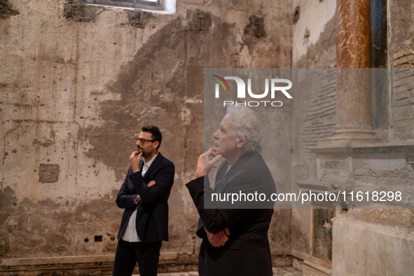 Poet Gabriele Tinti and director Abel Ferrara attend the ''Divine Echoes'' poems reading at Sant' Andrea De Scaphis in Rome, Italy, on Septe...