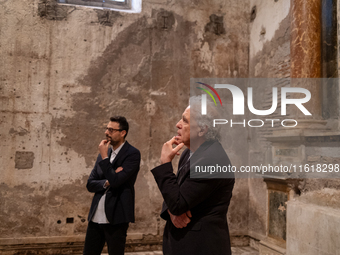 Poet Gabriele Tinti and director Abel Ferrara attend the ''Divine Echoes'' poems reading at Sant' Andrea De Scaphis in Rome, Italy, on Septe...