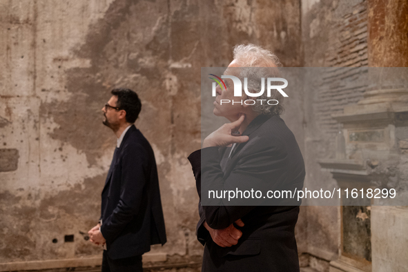 Poet Gabriele Tinti and director Abel Ferrara attend the ''Divine Echoes'' poems reading at Sant' Andrea De Scaphis in Rome, Italy, on Septe...