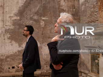 Poet Gabriele Tinti and director Abel Ferrara attend the ''Divine Echoes'' poems reading at Sant' Andrea De Scaphis in Rome, Italy, on Septe...