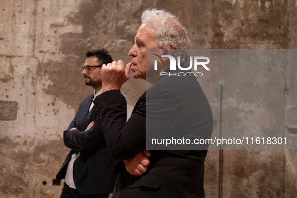 Poet Gabriele Tinti and director Abel Ferrara attend the ''Divine Echoes'' poems reading at Sant' Andrea De Scaphis in Rome, Italy, on Septe...