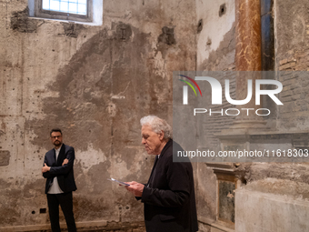 Poet Gabriele Tinti and director Abel Ferrara attend the ''Divine Echoes'' poems reading at Sant' Andrea De Scaphis in Rome, Italy, on Septe...