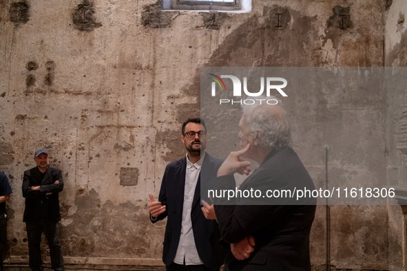 Poet Gabriele Tinti and director Abel Ferrara attend the ''Divine Echoes'' poems reading at Sant' Andrea De Scaphis in Rome, Italy, on Septe...