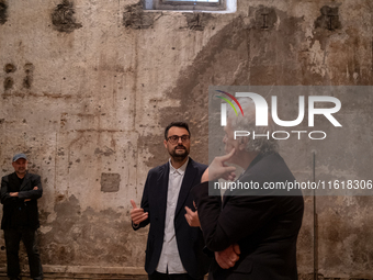 Poet Gabriele Tinti and director Abel Ferrara attend the ''Divine Echoes'' poems reading at Sant' Andrea De Scaphis in Rome, Italy, on Septe...