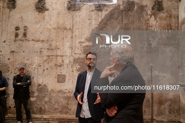 Poet Gabriele Tinti and director Abel Ferrara attend the ''Divine Echoes'' poems reading at Sant' Andrea De Scaphis in Rome, Italy, on Septe...