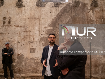 Poet Gabriele Tinti and director Abel Ferrara attend the ''Divine Echoes'' poems reading at Sant' Andrea De Scaphis in Rome, Italy, on Septe...