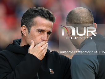 Marco Silva, manager of Fulham, has words with the fourth official ahead of the Premier League match between Nottingham Forest and Fulham at...