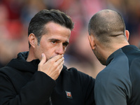 Marco Silva, manager of Fulham, has words with the fourth official ahead of the Premier League match between Nottingham Forest and Fulham at...