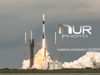 A SpaceX Falcon 9 rocket lifts off from launch pad 40 at the Cape Canaveral Space Force Station in Florida, carrying astronaut Nick Hague (N...