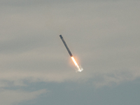 The first stage of the Falcon 9 rocket seconds before landing at complex LZ1 at the Cape Canaveral Space Station in Cape Canaveral, United S...