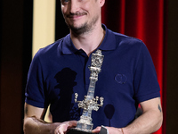 Francois Ozon receives the jury award for best script during the 72nd edition of the San Sebastian International Film Festival in San Sebast...