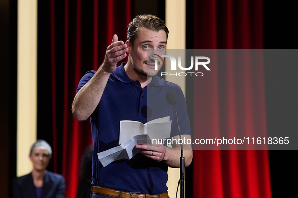 In San Sebastian, Spain, on September 28, 2024, actor Pierre Lottin receives the Silver Shell for Best Supporting Performance during the 72n...