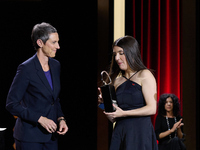 In San Sebastian, Spain, on September 28, 2024, director Laura Carreira receives the Silver Shell for Best Direction during the 72nd edition...