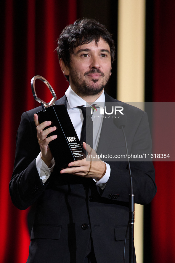 Pedro Martin-Calero receives the Silver Shell for Best Direction during the 72nd edition of the San Sebastian International Film Festival in...