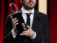 Pedro Martin-Calero receives the Silver Shell for Best Direction during the 72nd edition of the San Sebastian International Film Festival in...