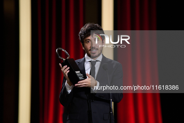 Pedro Martin-Calero receives the Silver Shell for Best Direction during the 72nd edition of the San Sebastian International Film Festival in...