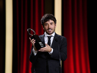 Pedro Martin-Calero receives the Silver Shell for Best Direction during the 72nd edition of the San Sebastian International Film Festival in...