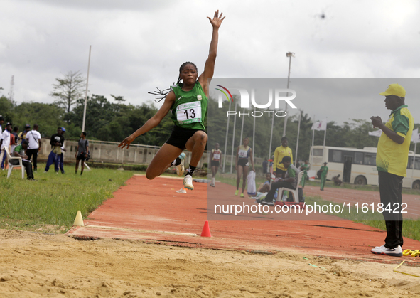 Morenikeji Taofikat of Federal University, Oye-Ekiti, Nigeria, jumps during the female long jump final at the 11th All Africa University Gam...