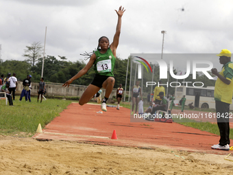 Morenikeji Taofikat of Federal University, Oye-Ekiti, Nigeria, jumps during the female long jump final at the 11th All Africa University Gam...