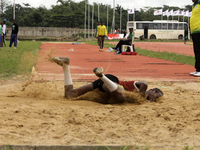 Success Udo-Gabriel of the University of Lagos, a bronze medallist in the triple jump, jumps during the final of the long jump, female categ...