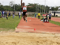 Success Udo-Gabriel of the University of Lagos, a bronze medallist in the triple jump, jumps during the final of the long jump, female categ...