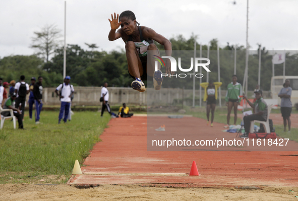 Olise Favour Amaka of Delta State University, Abraka, Delta State, Nigeria, bronze medallist, jumps during the final of the long jump, femal...