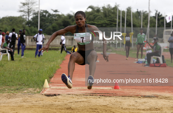 Olise Favour Amaka of Delta State University, Abraka, Delta State, Nigeria, bronze medallist, jumps during the final of the long jump, femal...