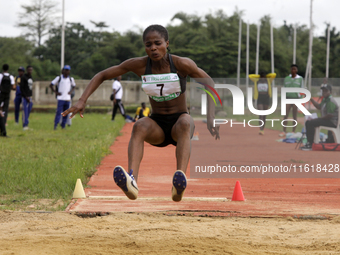 Olise Favour Amaka of Delta State University, Abraka, Delta State, Nigeria, bronze medallist, jumps during the final of the long jump, femal...