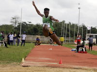 Adongo Celina of the University for Development Studies in Tamale, Ghana, gold medallist in the long jump female category, jumps during the...