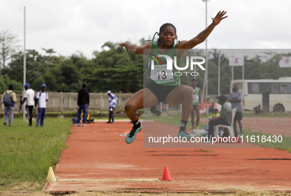 Morenikeji Taofikat of Federal University, Oye-Ekiti, Nigeria, jumps during the female long jump final at the 11th All Africa University Gam...