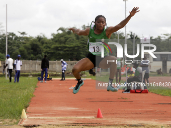 Morenikeji Taofikat of Federal University, Oye-Ekiti, Nigeria, jumps during the female long jump final at the 11th All Africa University Gam...