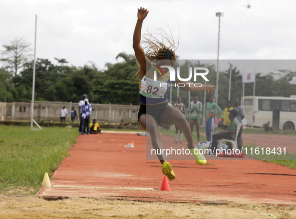 Agnes Adwoa Adjei of the University of Ghana, a silver medallist in the female long jump, competes during the final at the 11th All Africa U...