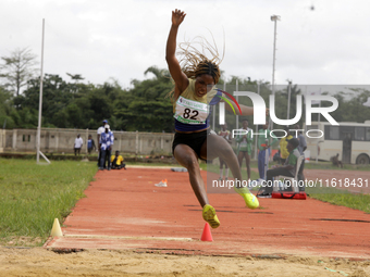 Agnes Adwoa Adjei of the University of Ghana, a silver medallist in the female long jump, competes during the final at the 11th All Africa U...