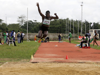 Polline Apiyo, a student from Gulu University in Uganda and a silver medallist in triple jump, competes during the long jump final in the fe...