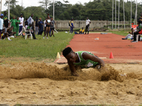 Adongo Celina of the University for Development Studies in Tamale, Ghana, gold medallist in the long jump female category, jumps during the...