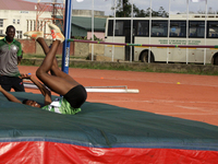 Adongo Celina of the University for Development Studies, Tamale, Ghana, gold medallist in the high jump female category, scales the bar duri...