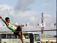 Adongo Celina of the University for Development Studies in Tamale, Ghana, scales the bar in the high jump female category during the 11th Al...