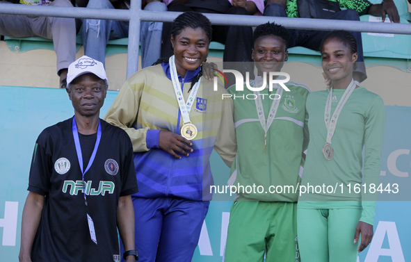 L-R: Bola Orodele, former Secretary General, Nigerian University Games Association (NUGA); Agnes Adwoa Adjei of the University of Ghana, sil...