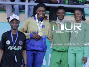 L-R: Bola Orodele, former Secretary General, Nigerian University Games Association (NUGA); Agnes Adwoa Adjei of the University of Ghana, sil...