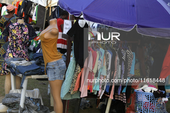 Sellers display sportswear and souvenirs during the 11th All Africa University Games at the University of Lagos, Akoka in Lagos, Nigeria, on...