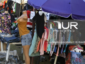 Sellers display sportswear and souvenirs during the 11th All Africa University Games at the University of Lagos, Akoka in Lagos, Nigeria, on...